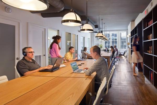 Dedicated desks in library space at 129 Newbury Street.