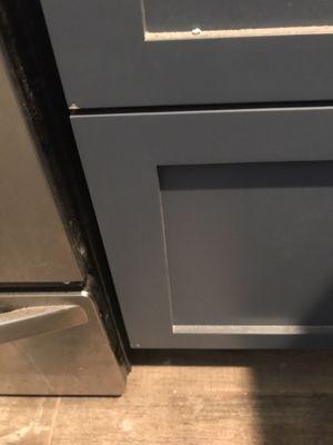 Chips in brand new cabinets. Asked for matching paint at least. No response.