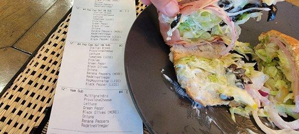 This is the ham sub. Order has no mayo yet the sandwich has a ton of mayo, soggy lettuce and a slice of ham.