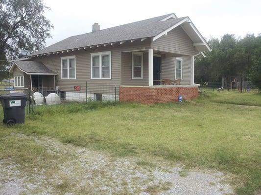 New Vinyl Siding -- New Roof -- New Security Doors -- all from Menards.