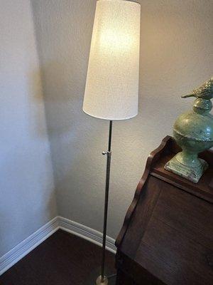 Skinny little accent floor lamp.