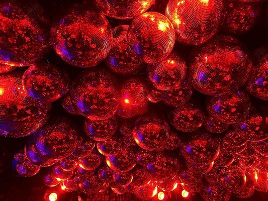 Ceiling in Arts Club Cabaret Room has 350 mirrored balls of various sizes.