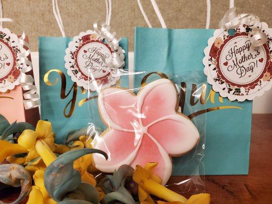 Plumeria Shortbread Cookies available in pink and yellow.