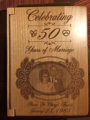 Wooden photo albums can be laser engraved to capture any great moment and create a family heirloom!