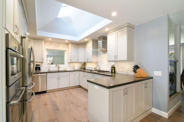 remodels utilizing ceiling & vertical spaces to brighten and create function