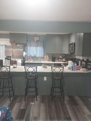 My new kitchen there was a wall before they opened up giving me the updated open concept that I was looking for! Please excuse the mess.