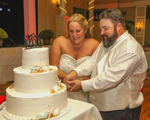 The cake was delicious and decorated to match our sea shore wedding