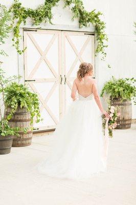 One of our beauties making her way across the front of our elegant white barn.