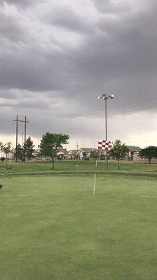 On the course as the storms rolled in.