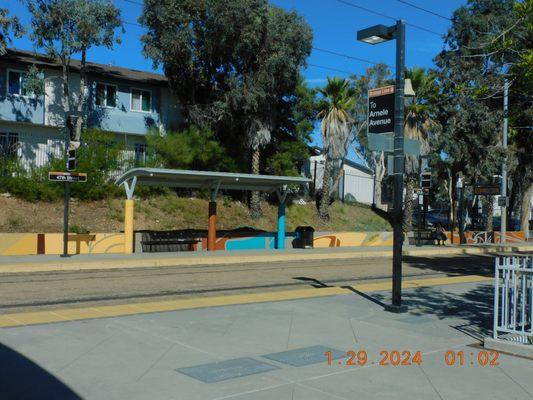 The station is one that has people coming from the apartments and the many entrances near the trolley station .