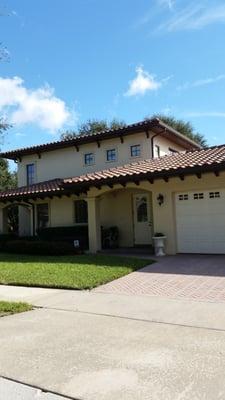 We painted this house when it was built almost 8 years ago and we come back annually to pressure clean it. Still looks great.