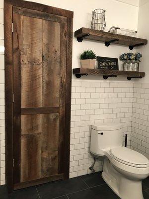 Amazing reclaimed wood door and shelves! Superior service and exceptional craftsmanship!