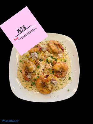 "Mo's Shrimp And Grit Sauce" w/ Andouillle Sasuage and Crawfish Tails.