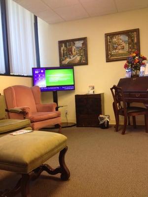 Cute waiting room with plus chairs