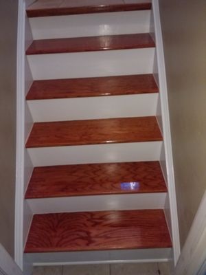 Staircase was originally pine painted brown. I replaced with oak treads that I stained and poly finished and put in new risers.