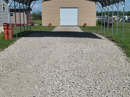 Added rock and graded driveway.