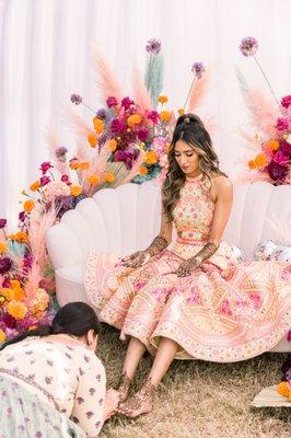 Touching up my brides Mehndi on her feet for photos