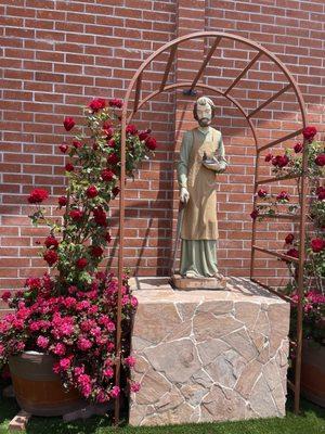 Statue of Saint Joseph, the laborer outside of the church.