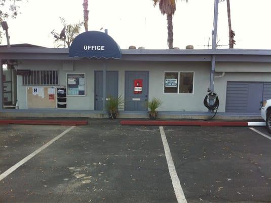 Office is the one with orange lifejacket on the door.