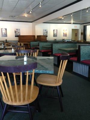 Booths and tables in the main eating area