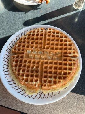 Nana look! It says Waffle House "Waffle Single" with a side of crispy bacon.