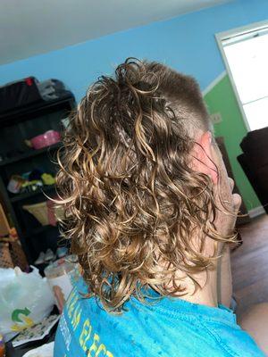 Fresh perm , this goes with a mullet .