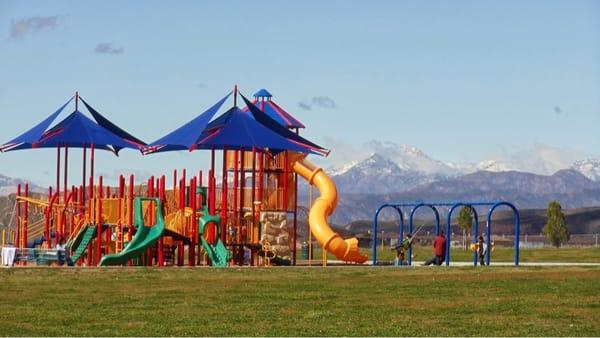 Very nice play area surrounded by large, grassy playing fields.