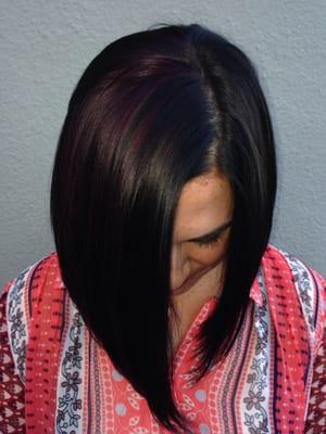 Dark brown with violet underneath