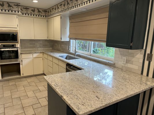 Beautiful granite with subway backsplash !!