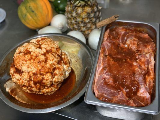 Marinated Pork Pastor and Marinated Cauliflower Pastor before being smoked.