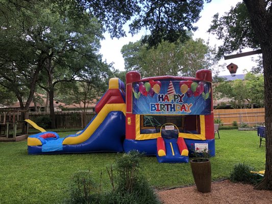 Bounce house with slide