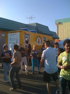 Groovin with the music in front of the Tropical Shave Ice truck.