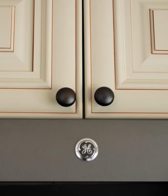 Close-up on the all-wood kitchen cabinets.