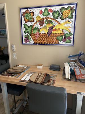 My kitchen breakfast nook: 24 six-inch square tiles mounted and framed by Paul. Beautifully done.