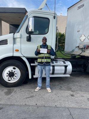 Meet our latest success story! Now a fully trained and confident truck driver, ready to conquer the road ahead.