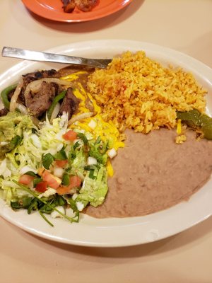 Fajita and enchilada plate