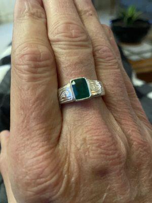 Silver ring with emerald stone