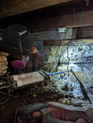 Concrete spalling on a deteriorated foundation.