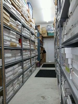 Our Backroom with millions of single sports cards.  Please order online rookieshq.com