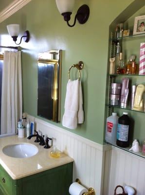 Installed beadboard wainscoting and a new vanity, painted and plumbed. Fabulous !!