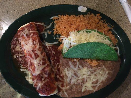 Beef burrito and beef taco dinner with rice and beans