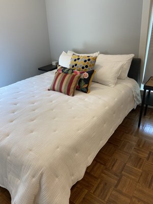 beautiful bed made in an airbnb