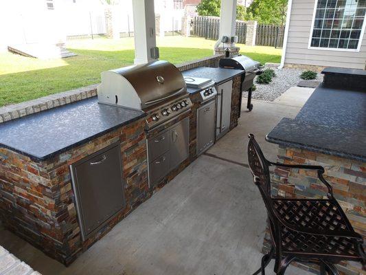 Outdoor kitchens instantly increase your entertaining space!