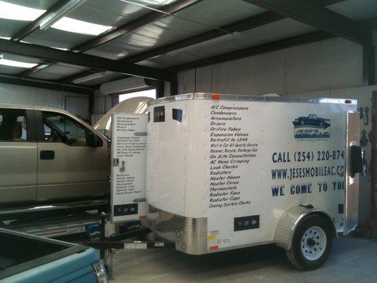 JMAC at Pro Touch's Body Shop recharging a truck on the frame machine.