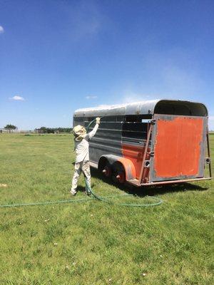 Blasting on a 6x16 bumper pull stock trailer.