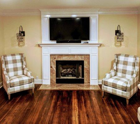 Custom made fireplace surround and mantel manufactured and installed.