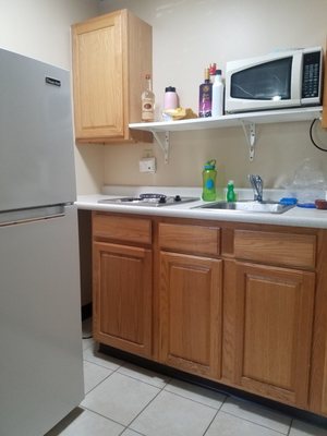 Kitchenette with large refrigerator.  Perfect size.  I always bring my own teflon skillet though.