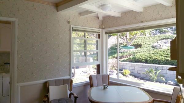 Elegant leaf trail wallpaper installed in the kitchen.