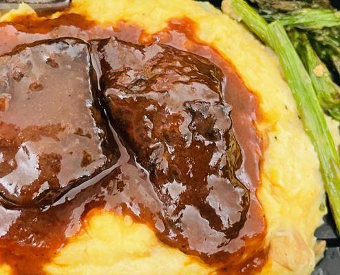 BBQ Rib Tips over Mashed Potatoes Potatoes and Asparagus