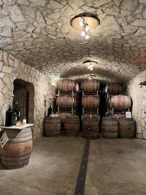 The beautiful barrels inside the stunning stone indoor private tasting room.